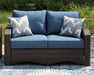 Windglow Outdoor Loveseat with Cushion - MR ZEE FURNITURE