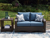 Windglow Outdoor Loveseat with Cushion - MR ZEE FURNITURE